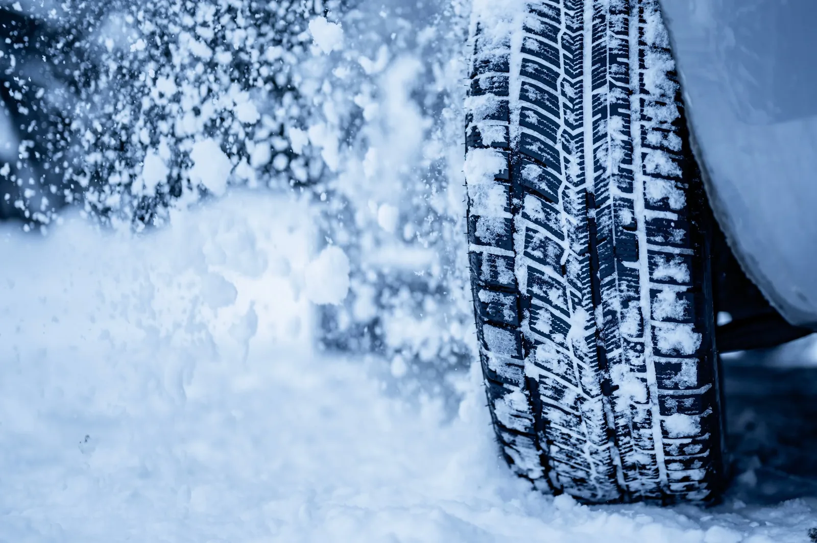 Winter tire tread in snow, ready for a seasonal swap