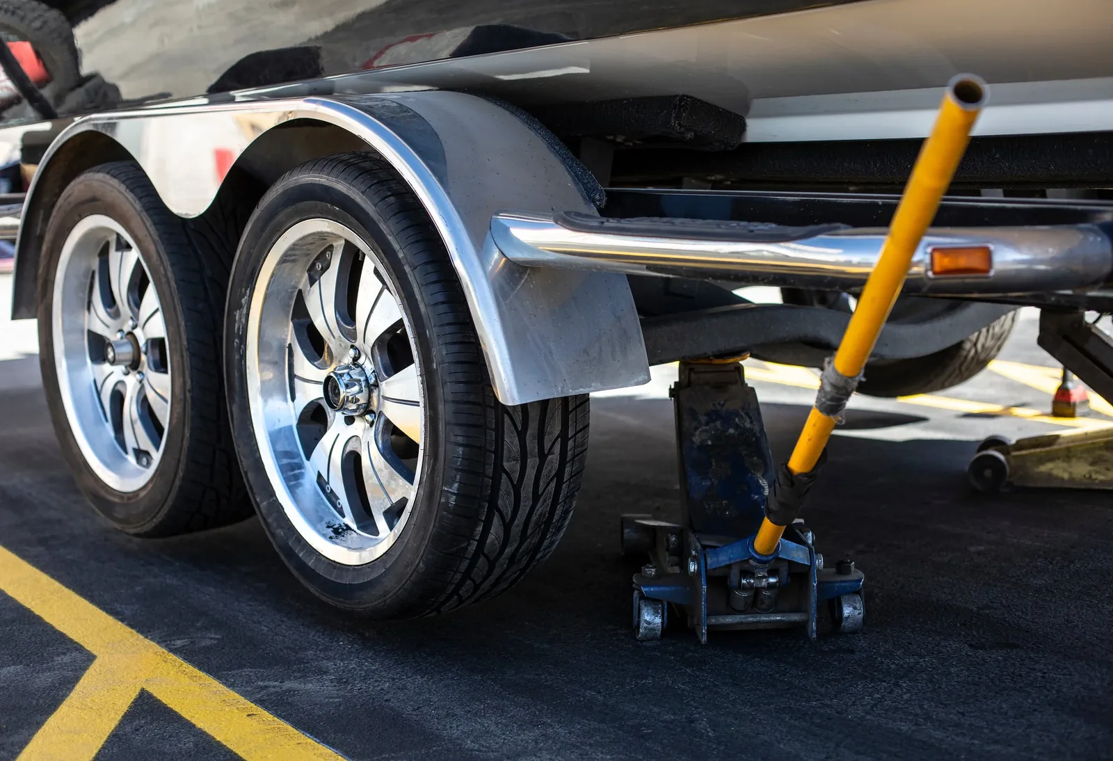 Trailer wheels and tires being serviced